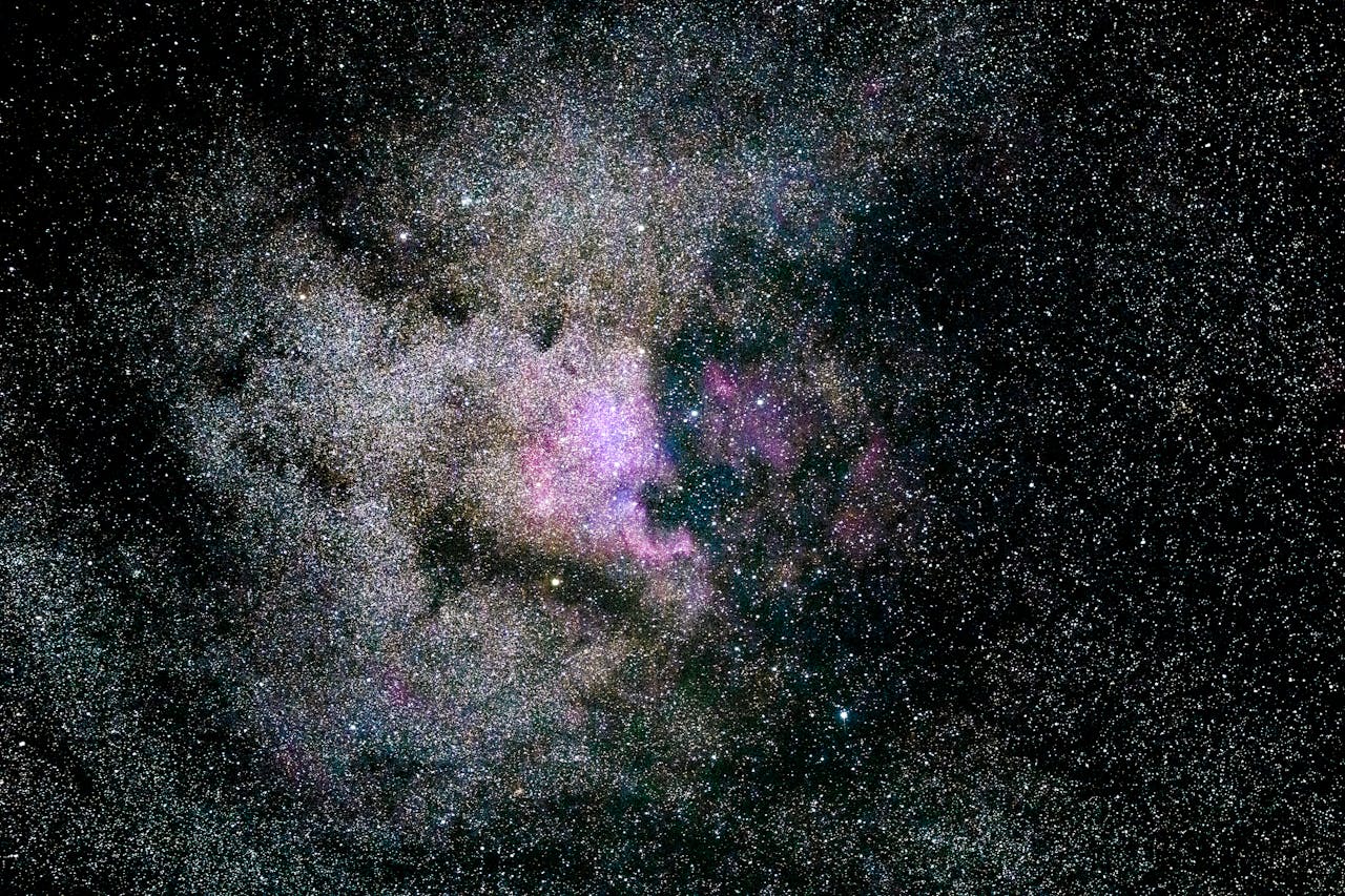 Captivating image of a vibrant nebula filled with stars in the expansive universe.